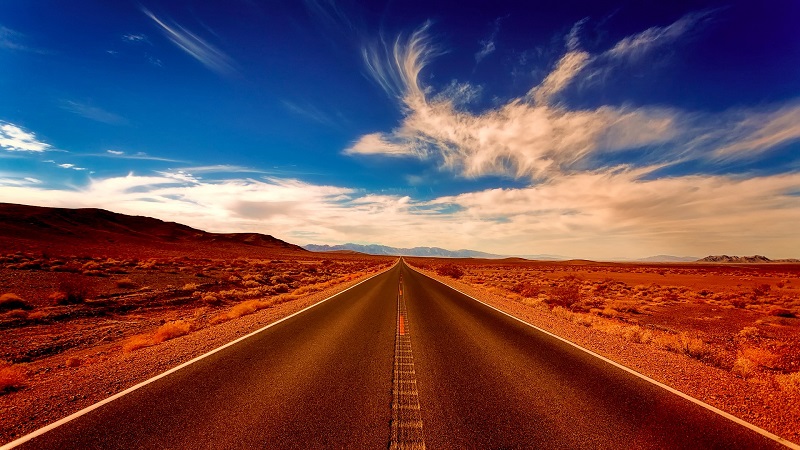 Image of a road in the desert (Flickr: https://www.flickr.com/photos/155486519@N03/35007792796)