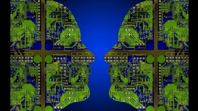 Image of two faces depicting artificial intelligence. Image from Flickr - Artificial intelligence (image: Flickr https://www.flickr.com/photos/alansimpsonme/34715802120)