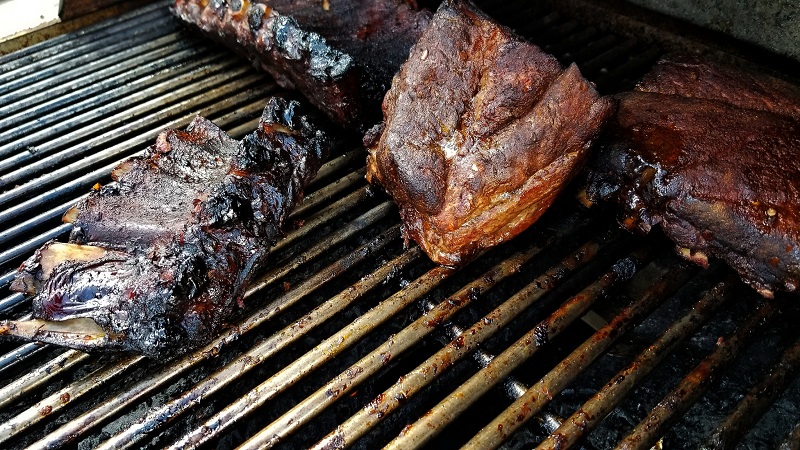 Image of meat on a BBQ (image from Flickr: https://www.flickr.com/photos/question_everything/40629274974)