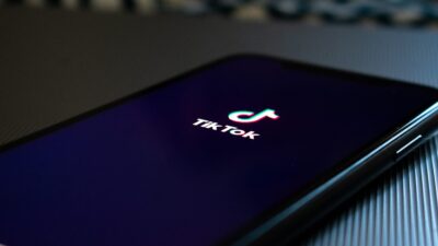 Photo of a TikTok logo on a phone